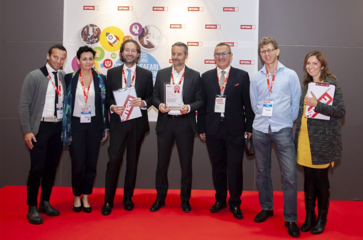 Foto del conferimento del Premio Innovazione SMAU il 25.10.2018 presso SMAU Milano – FieraMilanoCity. Da sinistra: Mirko Fantini – Würth Italia Antonella La Notte – CEO Hevolus Innovation Pierantonio Macola – Presidente SMAU Nicola Piazza – Amministratore delegato Würth Italia Antonio Squeo – CIO Hevolus Innovation Joe Varrasso – HoloLens Partner Sales Executive Chiara Albicocco – Giornalista scientifica Foto del conferimento del Premio Innovazione SMAU il 25.10.2018 presso SMAU Milano – FieraMilanoCity. Da sinistra: Mirko Fantini – Würth Italia Antonella La Notte – CEO Hevolus Innovation Pierantonio Macola – Presidente SMAU Nicola Piazza – Amministratore delegato Würth Italia Antonio Squeo – CIO Hevolus Innovation Joe Varrasso – HoloLens Partner Sales Executive Chiara Albicocco – Giornalista scientifica